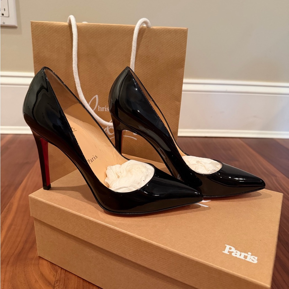 Christian Louboutin Pigalle 100 pump in black patent calf leather